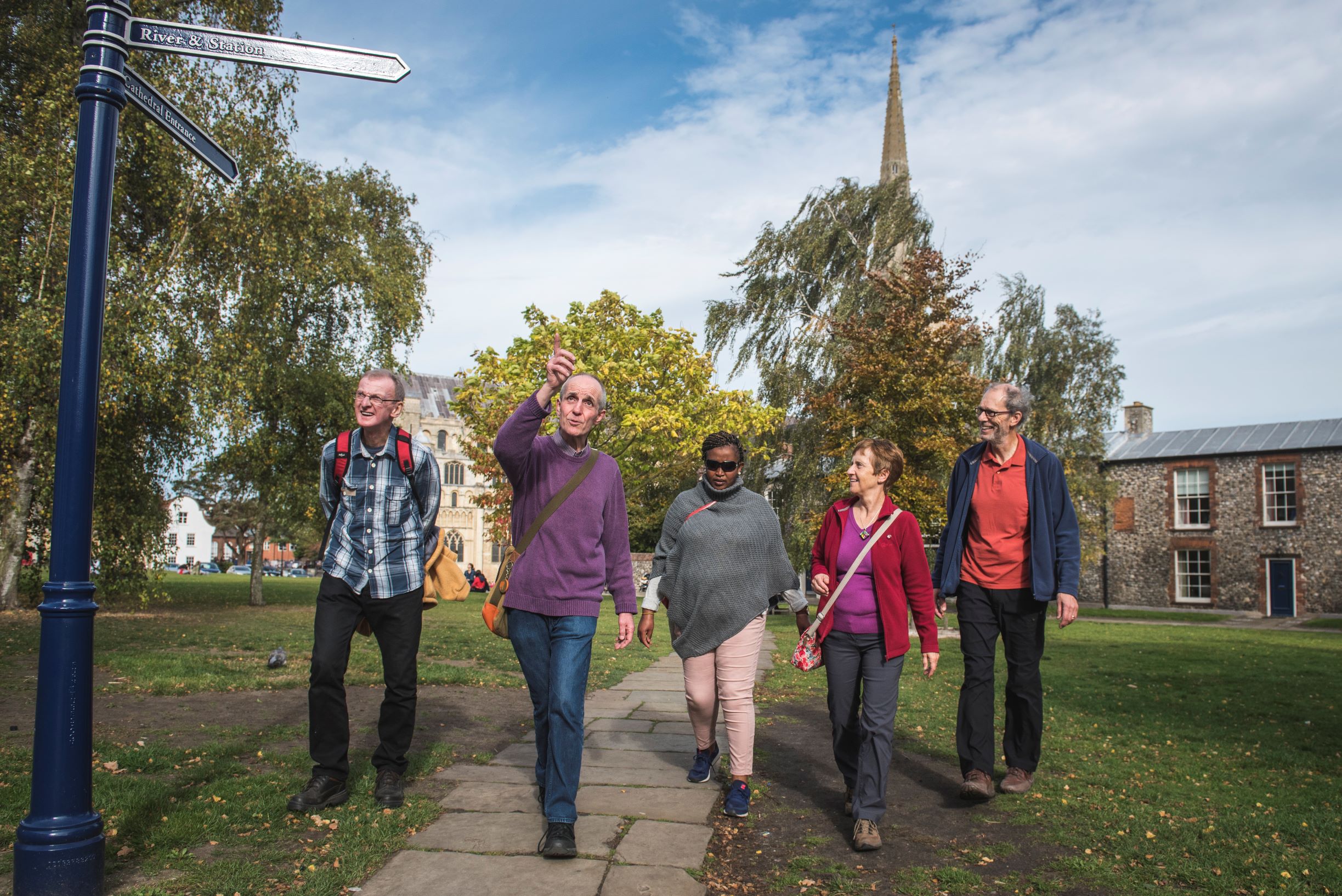A Guide leading a group on a walk in Norwich